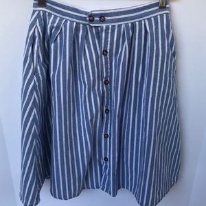 *Blue/white stripe skirt, American flag buttons.